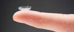 Contact Lens On A Fingertip