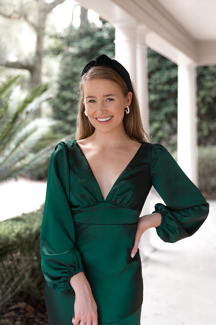 long sleeve green evening gown, black velvet lele sadoughi headband, pearl hoop earrings