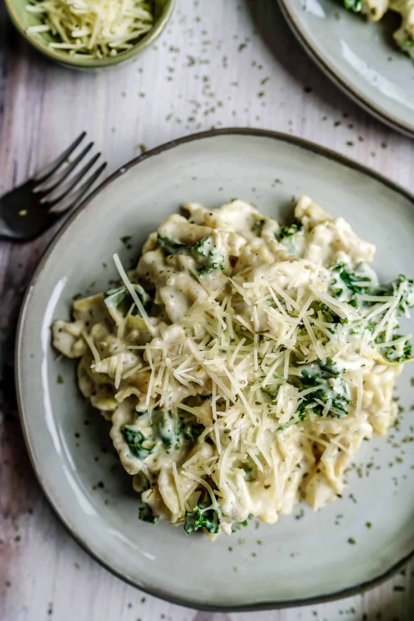 Who can resist a twist on one of our all-time favorite dips? Not us! This deliciously creamy Spinach and Artichoke Mac and Cheese dish is irresistibly good and will have your loved ones running to the kitchen for seconds - or thirds!