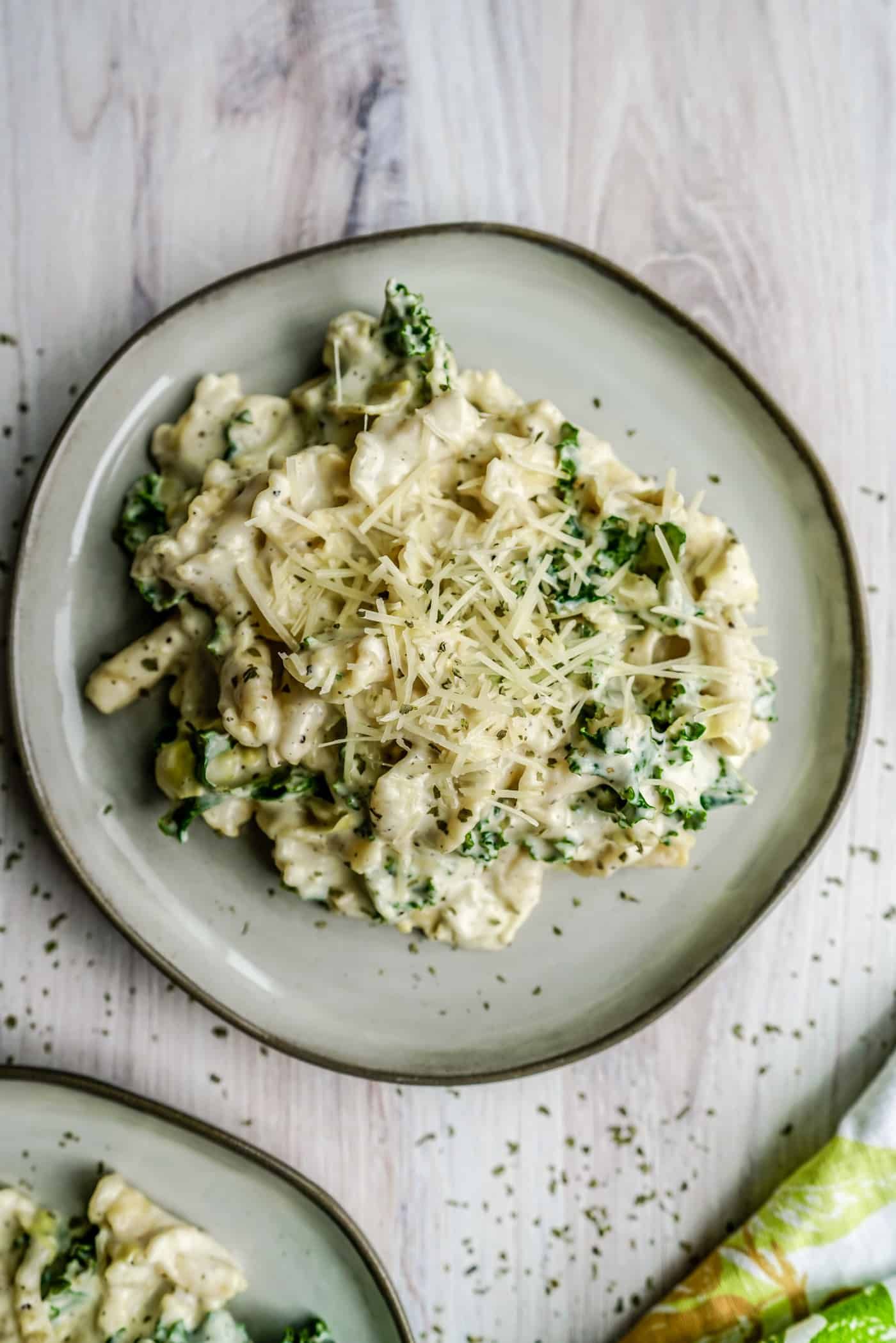 Who can resist a twist on one of our all-time favorite dips? Not us! This deliciously creamy Spinach and Artichoke Mac and Cheese dish is irresistibly good and will have your loved ones running to the kitchen for seconds - or thirds!