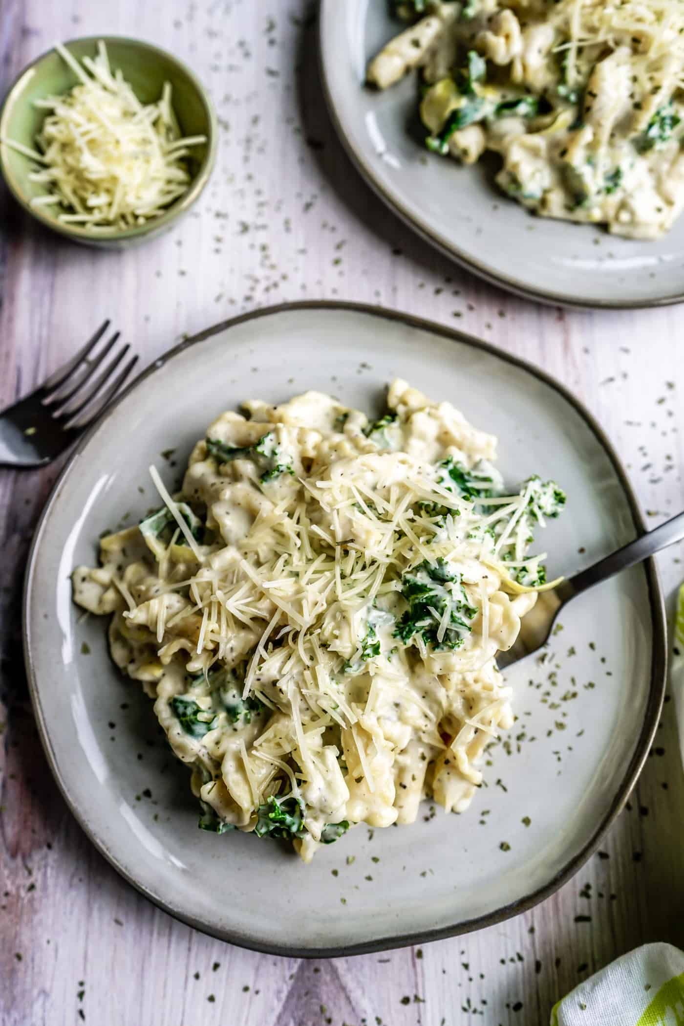 Who can resist a twist on one of our all-time favorite dips? Not us! This deliciously creamy Spinach and Artichoke Mac and Cheese dish is irresistibly good and will have your loved ones running to the kitchen for seconds - or thirds!