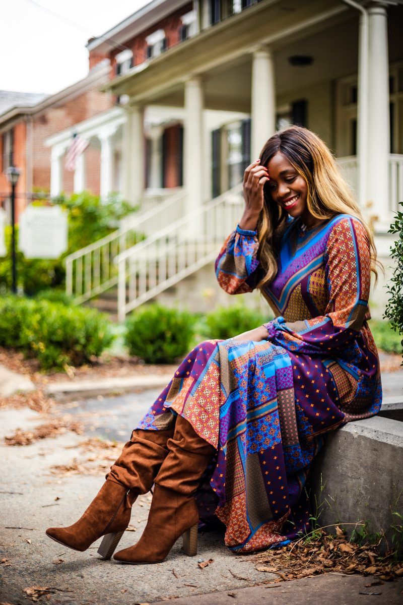 Scoop at Walmart: A New Budget-Friendly Collection That Needs to Be On Your Radar by popular Washington DC fashion blogger, Alicia Tenise: image of a woman outside wearing a Walmart Scoop Scoop Blouson Sleeve Maxi Dress Chevron Print, Scoop Penny Microsuede High Heel Slouch Boot, and holding a Scoop Faux Crocodile Small Crossbody Chain Strap Bag.