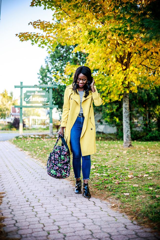 Blogger Alicia Tenise styles a Yellow Trench Coat from Chicwish, raw hem skinny jeans and patent leather booties. - The Ultimate Weekend Packing List for Fall by Washington DC travel blogger Alice Tenise