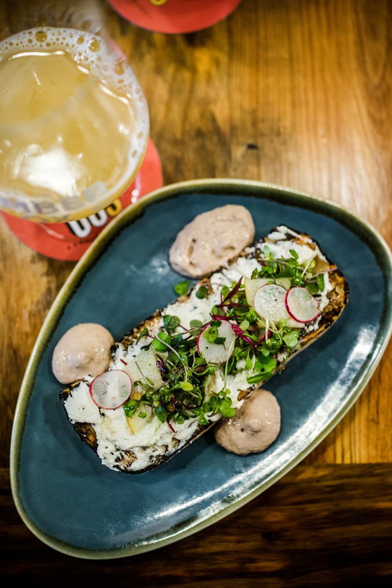 Chicken Liver Toast at the Williamsburg Taste Festival - Fun at the Williamsburg Taste Festival featured by popular DC travel blogger, Alicia Tenise