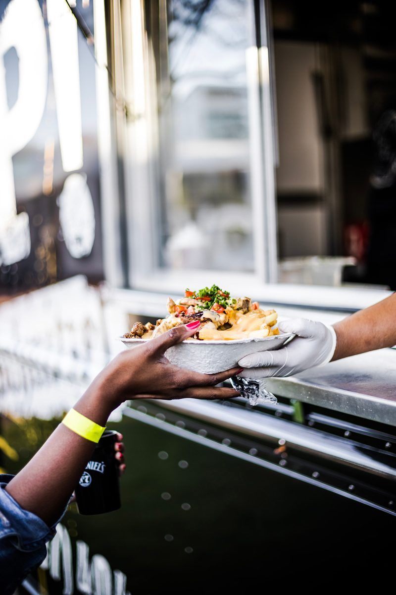 Poutine Fries from Prost Food Truck - Fun at the Williamsburg Taste Festival featured by popular DC travel blogger, Alicia Tenise