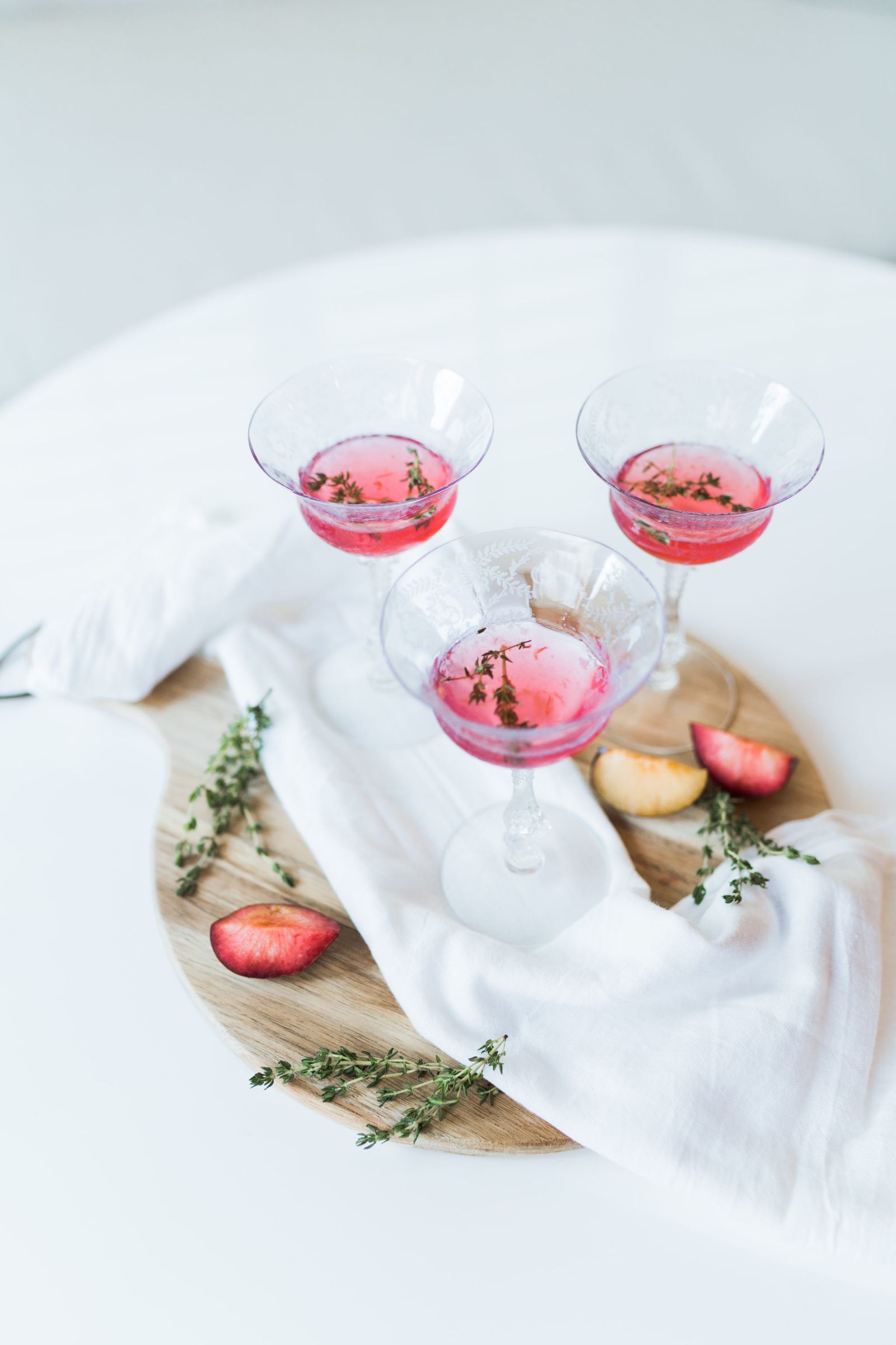 muddled plum and thyme cocktail