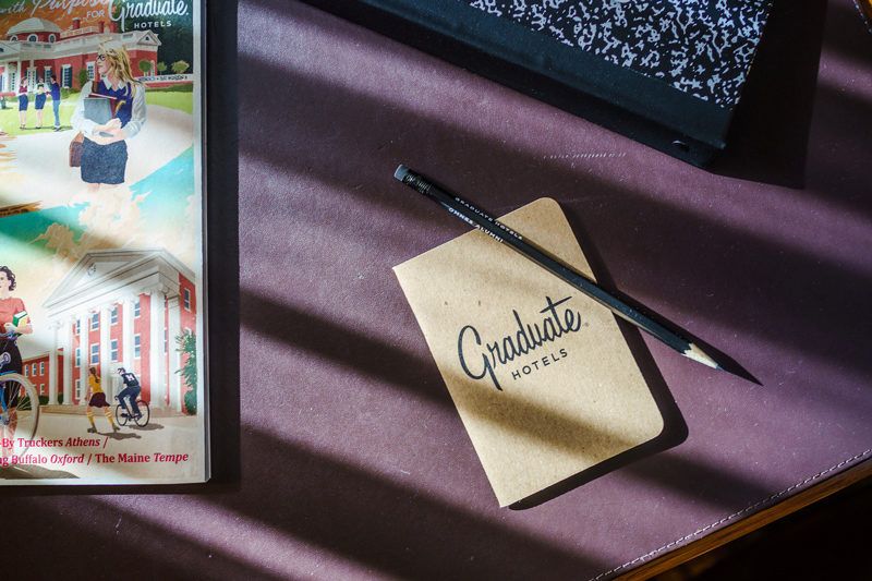 Top Things to Do in Charlottesville VA: a Complete Travel Guide by popular DC travel blogger, Alicia Tenise | Things to Do in Charlottesville VA in the Winter by popular DC travel blogger, Alicia Tenise: image of a Graduate Hotels notebook.