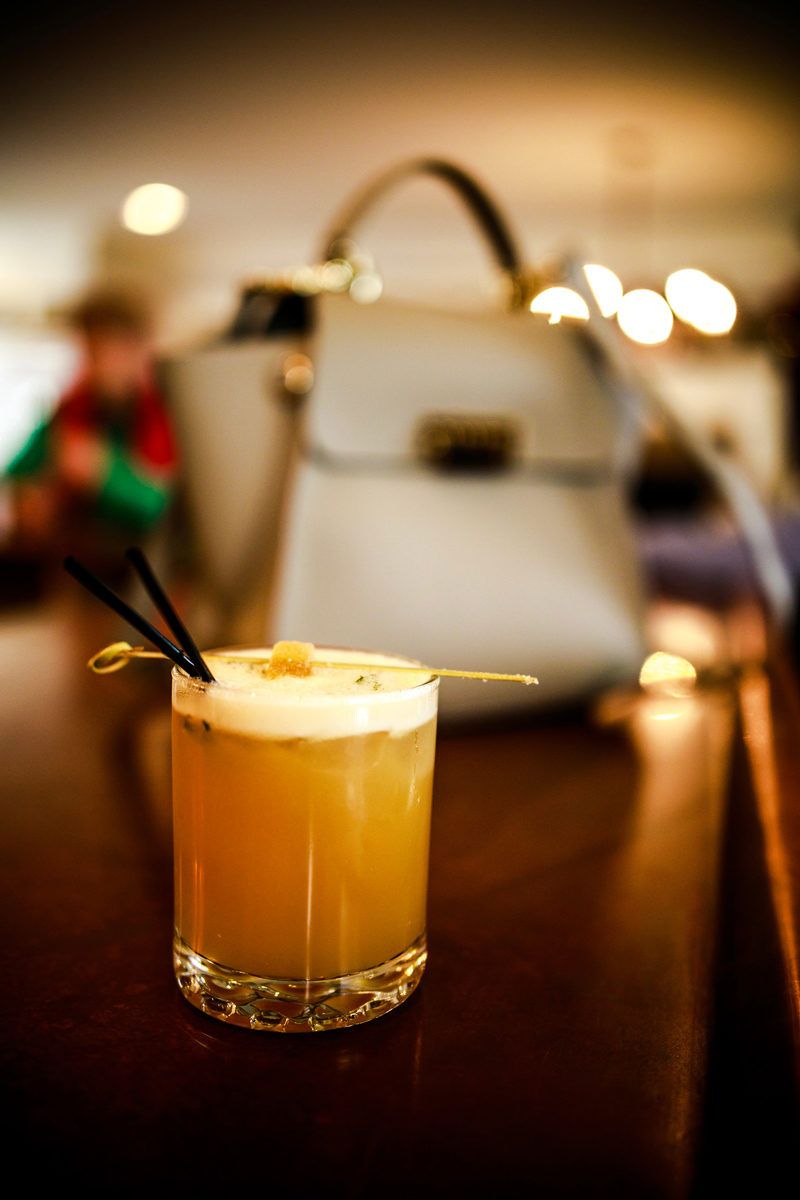 Top Things to Do in Charlottesville VA: a Complete Travel Guide by popular DC travel blogger, Alicia Tenise | Things to Do in Charlottesville VA in the Winter by popular DC travel blogger, Alicia Tenise: image of a bourbon cocktail drink.