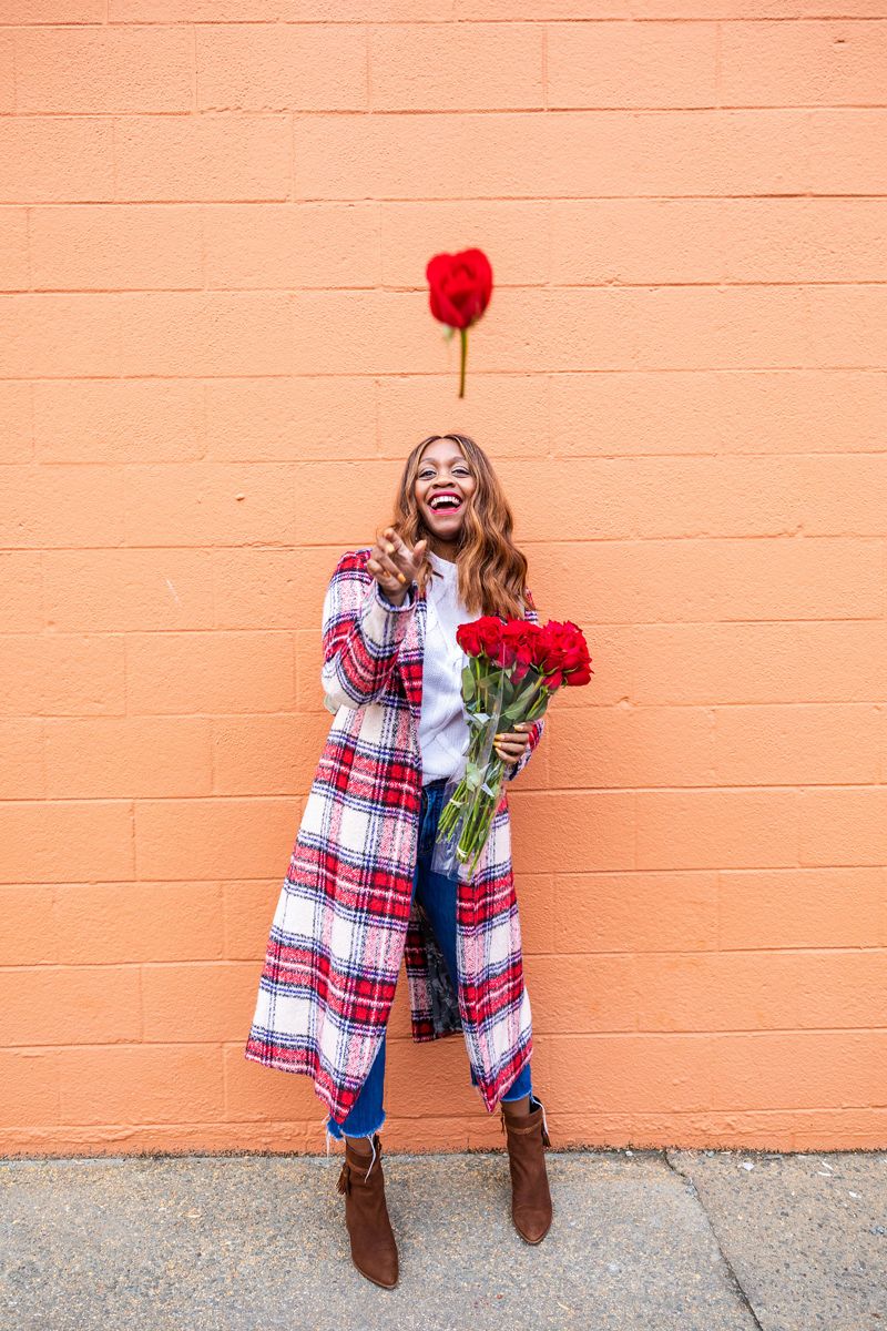 Casual Winter Uniform featured by top US fashion blogger Alicia Tenise; Image of woman wearing NVLT plaid coat, Everlane sweater, Mother jeans, Zac Zac Posen bag, Kendra Scott earrings and Laura Mercier lipstick.