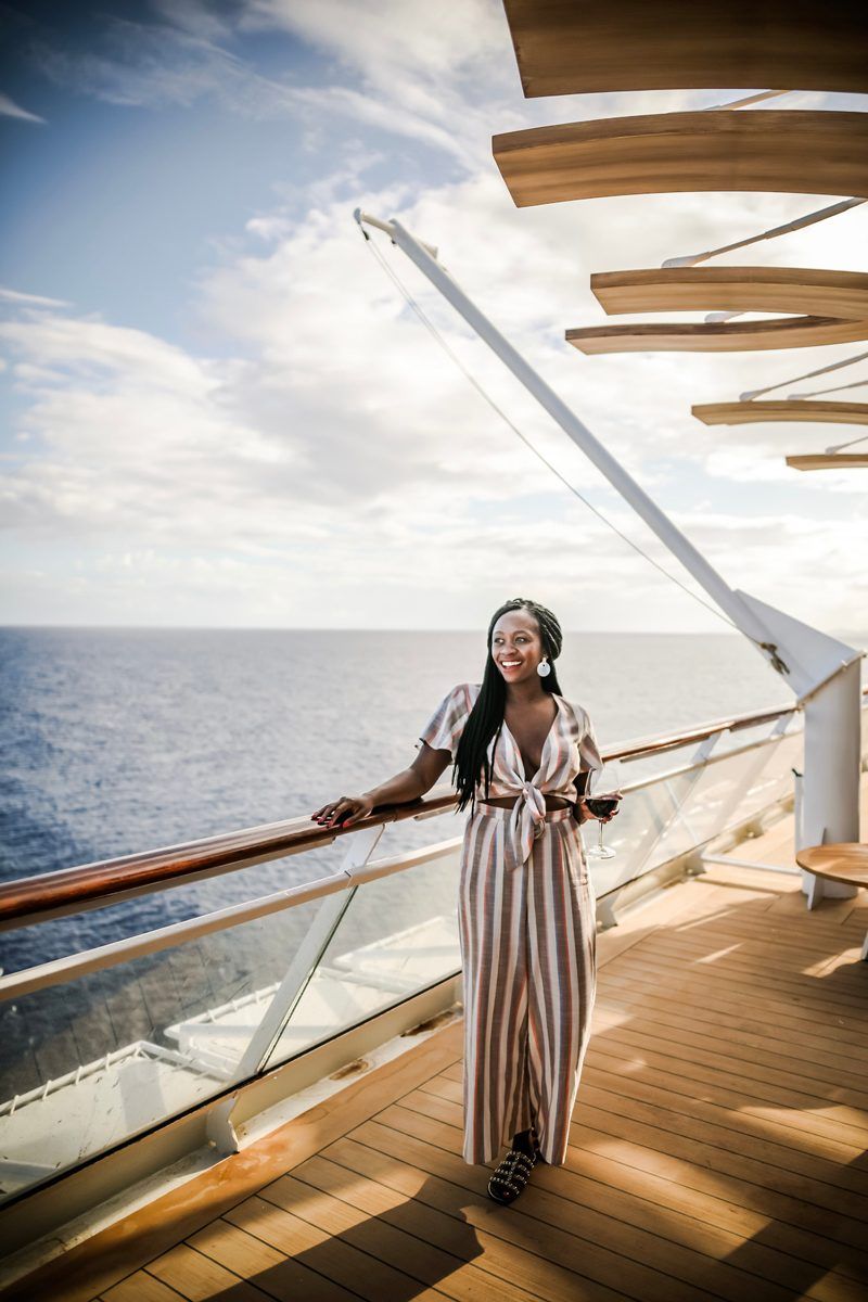 Rent the Runway Review featured by top US fashion blogger Alicia Tenise; Image of a woman wearing Show Me Your Mumu Val Jumpsuit.