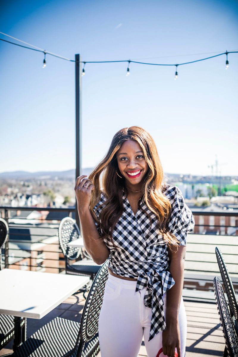 Rent the Runway Review featured by top US fashion blogger Alicia Tenise; Image of a woman wearing Gingham Wrap Top.