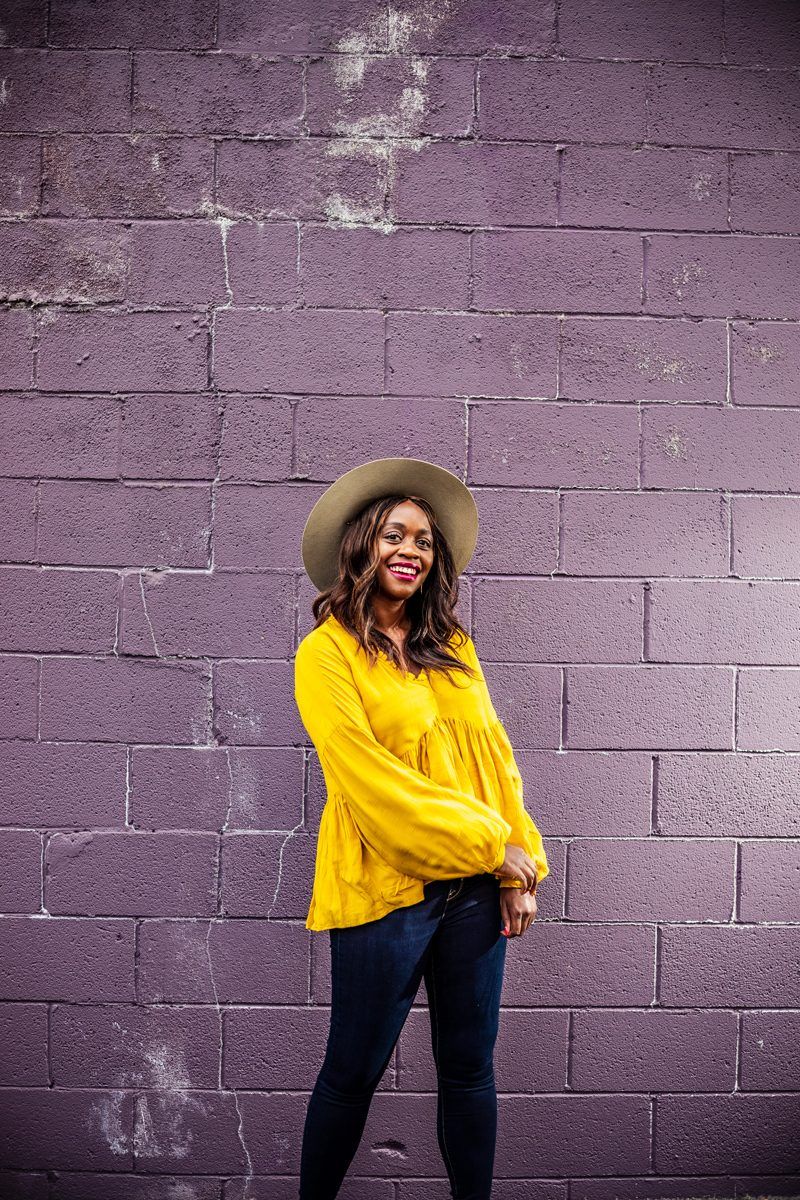Time and Tru Women's Ruffle Edge Peasant Top | Summer to Fall Looks: Two Transitional Outfit Ideas Under $100 by popular Washington D.C. fashion blogger, Alicia Tenise: image of a woman standing in front of a purple brick wall and wearing a Walmart Time and Tru Women's Ruffle Edge Peasant Top, Walmart Time and Tru Time and Tru Women's Sculpted Jegging, and Walmart Classic Vintage Winter Wide Brim Fedora Hat 961SH Image 1 of 1 Tell us if something is incorrect Pop Fashionwear Classic Vintage Winter Wide Brim Fedora Hat.