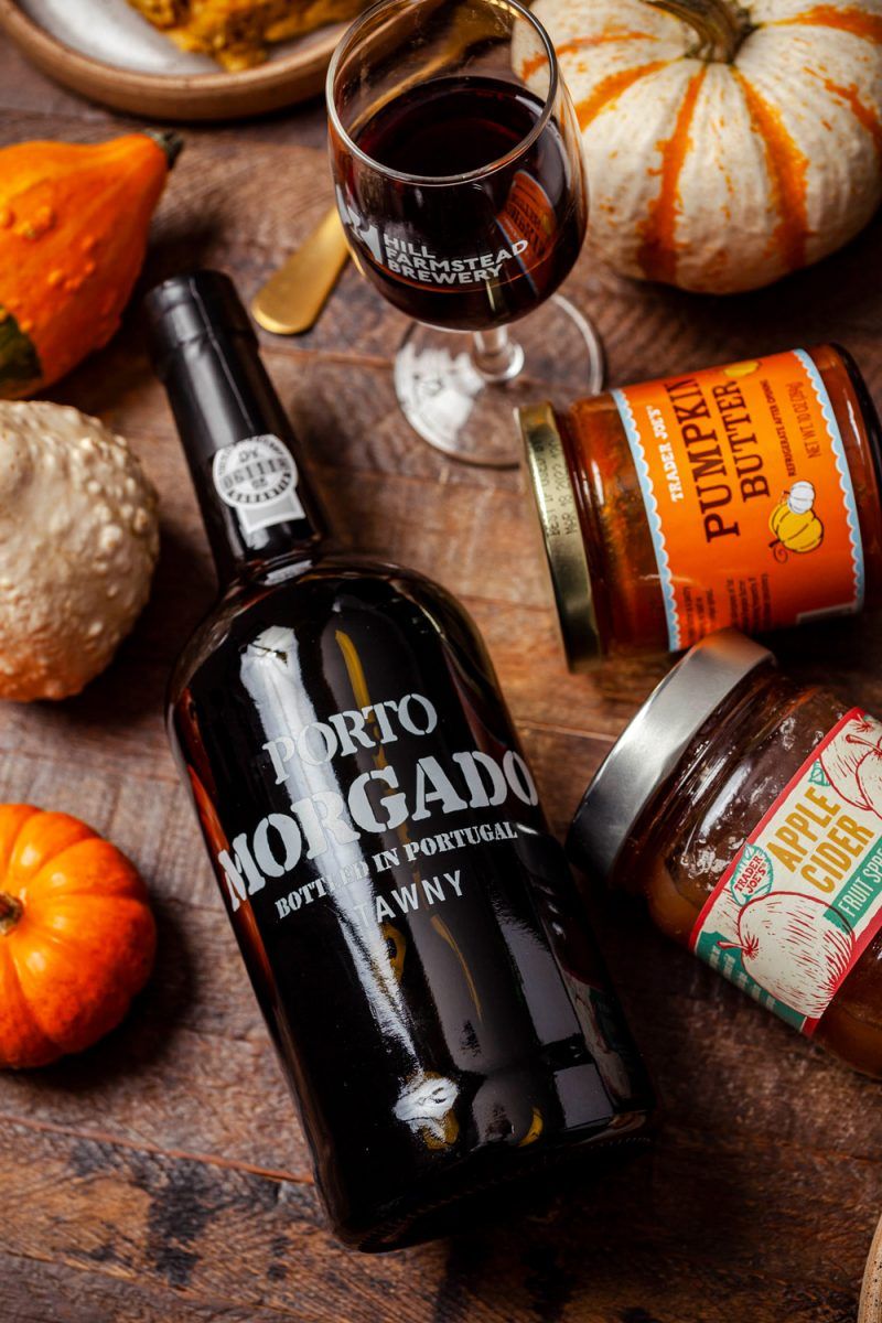 Porto Morgado from Trader Joe's | Trader Joe's Pumpkin Waffle Bread Pudding Recipe | Trader Joe's Fall Recipe Ideas | Trader Joe's Wine by popular D.C. lifestyle blogger, Alicia Tenise: image of pumpkin waffle bread pudding, Trader Joe's pumpkin butter, mini pumpkins, and Trader Joe's Porto Morgado wine.