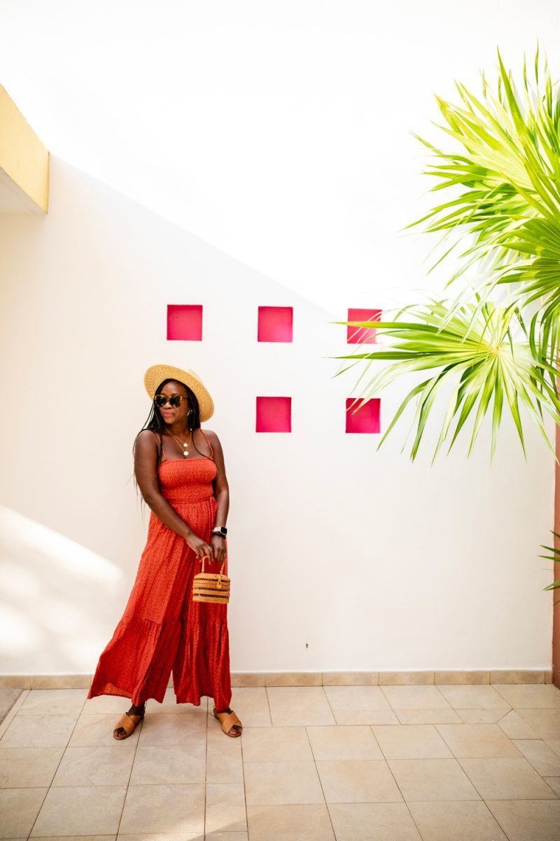 Free People Little Of Your Love Jumpsuit | How to Deal with Stress and Anxiety by popular DC lifestyle blogger, Alicia Tenise: image of a woman wearing a ShopBop Free People Free People Little Of Your Love Jumpsuit, Nordstrom Brixton Joanna Straw Hat, ShopBop Karen Walker The Number One Sunglasses, and holding a Moda Operandi Cult Gaia bag.