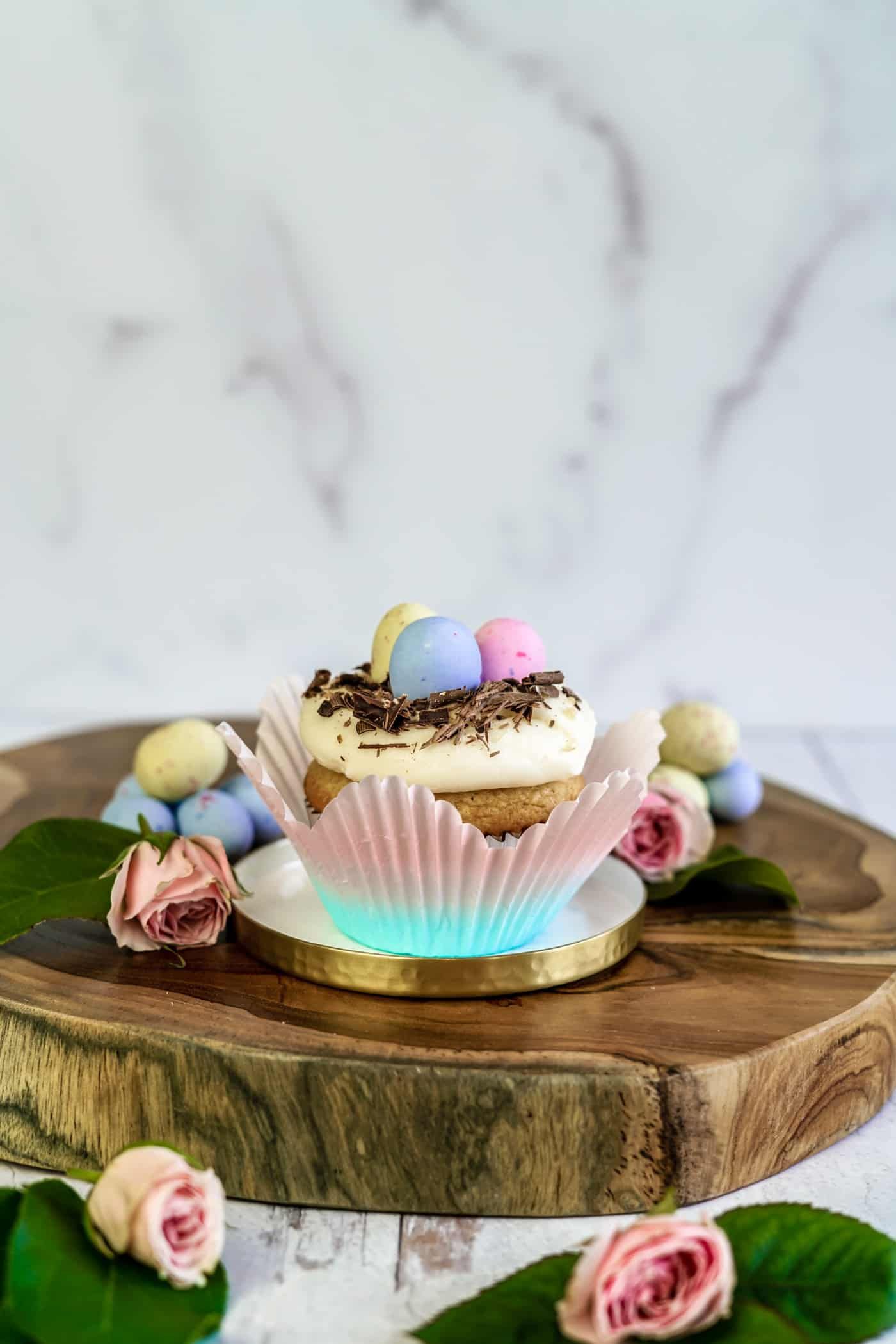 One Easter Egg Cupcakes topped with chocolate and easter eggs