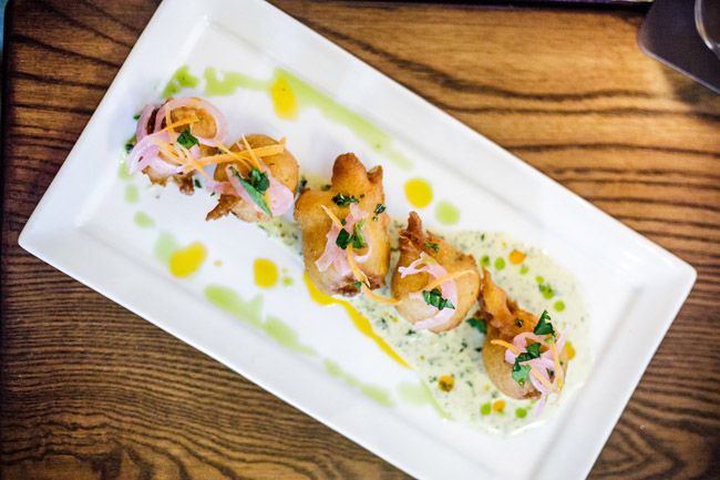 Crabmeat Beignets - 7 New Orleans Restaurants featured by popular DC travel blogger, Alicia Tenise