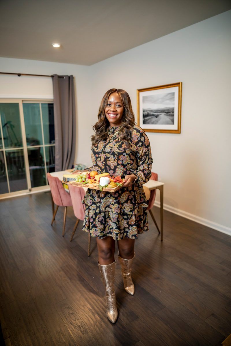 Thanksgiving Outfit Idea, Scoop Women's Tiered High Neck Dress |Holiday Outfits by popular D.C. fashion blogger, Alicia Tenise: image of Alicia Tenise wearing a Walmart Scoop Women's Tiered High Neck Dress and Walmart Scoop Women’s Poppy High Heeled Metallic Boots.