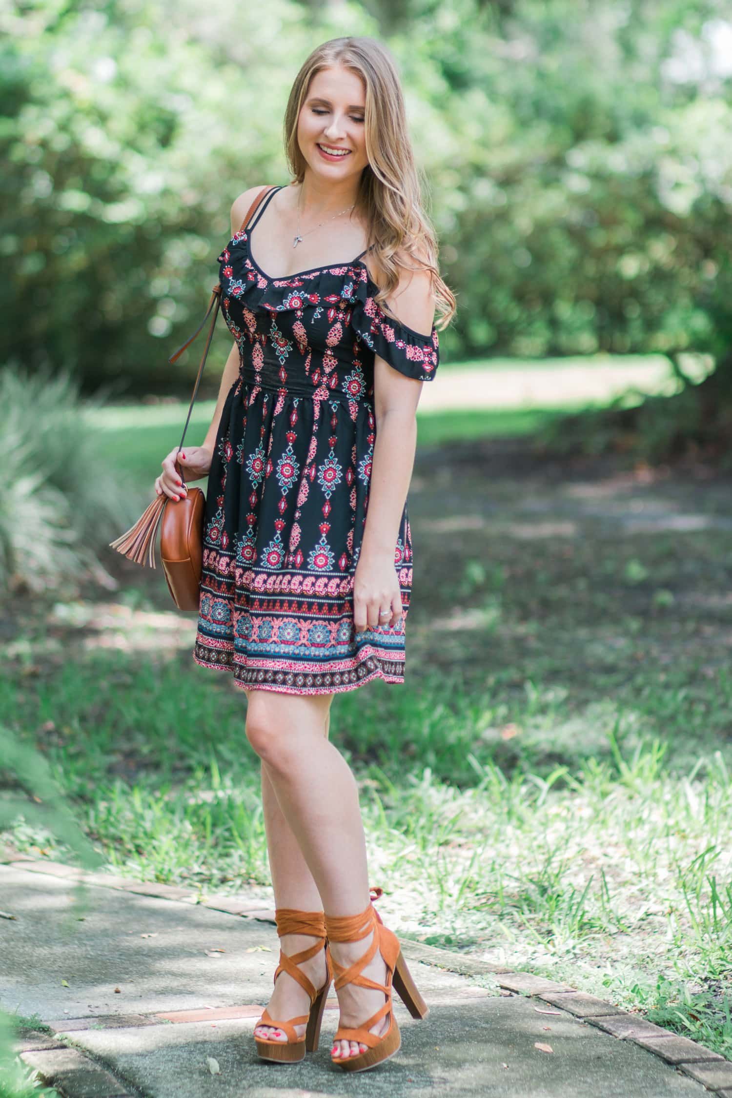 A girl can never own too many dresses- especially in the summertime! My go-to summer date night look is an off-the-shoulder sundress with cognac lace-up heels and soft curls. In addition to being a cute summer outfit idea, it's also extremely affordable. Everything in this look is under $40! Click through this pin to see the full look from Ashley Brooke Nicholas! | #MyHCLook sponsored by Hair Cuttery