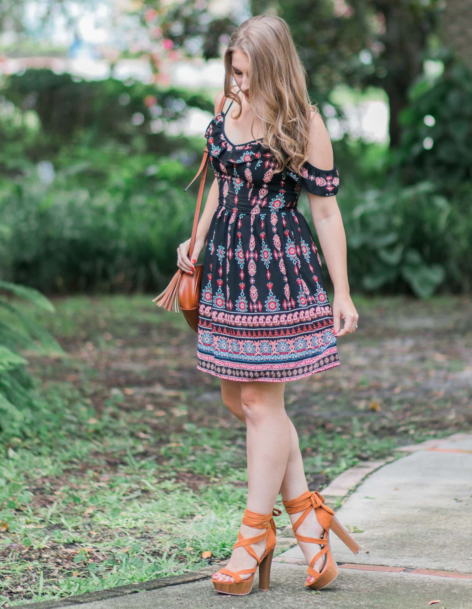 A girl can never own too many dresses- especially in the summertime! My go-to summer date night look is an off-the-shoulder sundress with cognac lace-up heels and soft curls. In addition to being a cute summer outfit idea, it's also extremely affordable. Everything in this look is under $40! Click through this pin to see the full look from Ashley Brooke Nicholas! | #MyHCLook sponsored by Hair Cuttery
