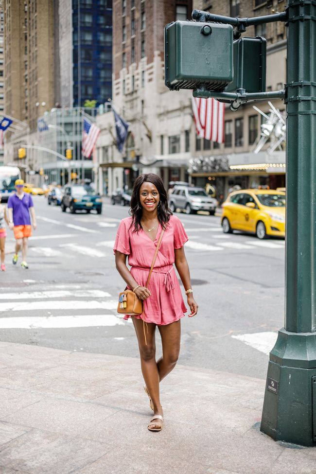 Blogger Alicia Tenise styles the ASTR Satin Ruffle Hem Romper from the 2017 Nordstrom Anniversary Sale
