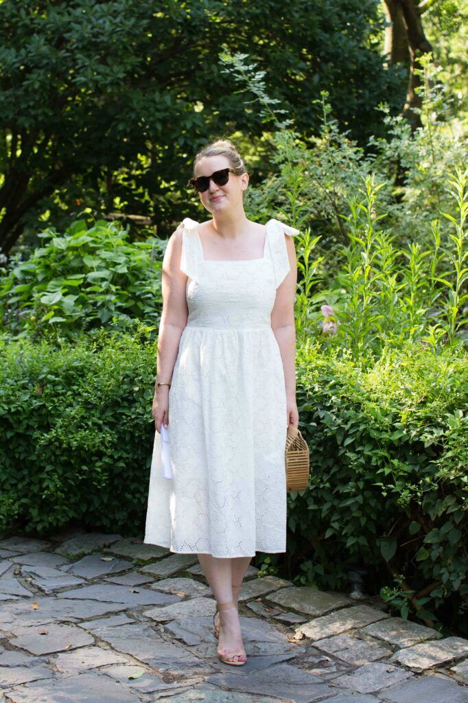 Meghan Donovan of wit & whimsy styles an eyelet dress with bow shoulders