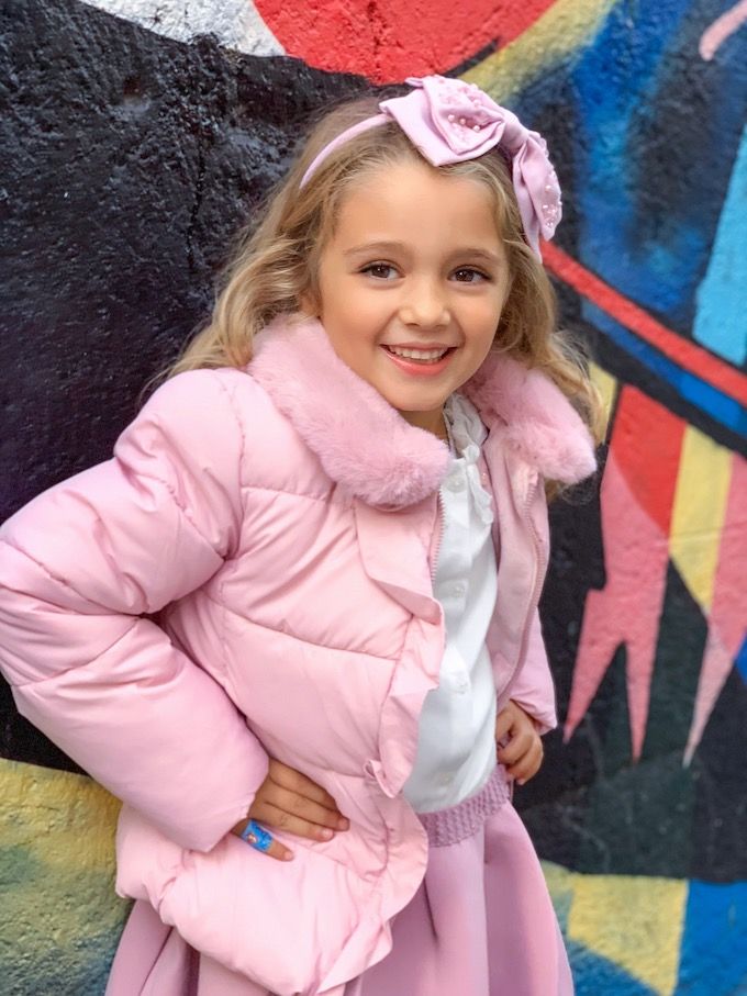 Un look invernale da bambina in rosa