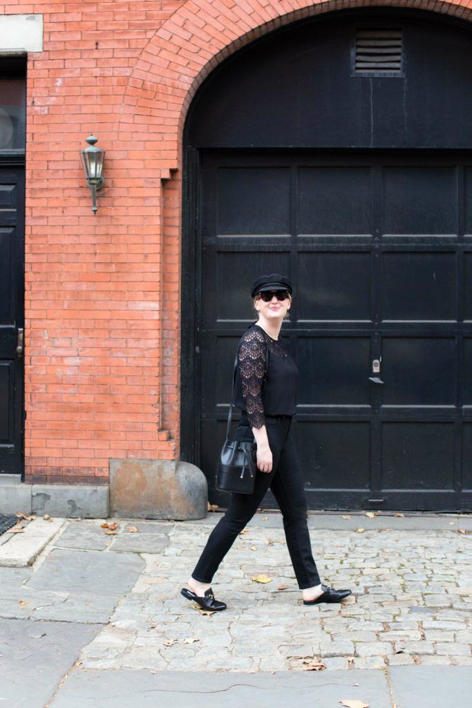 An All Black Look styled with a newsboy cap
