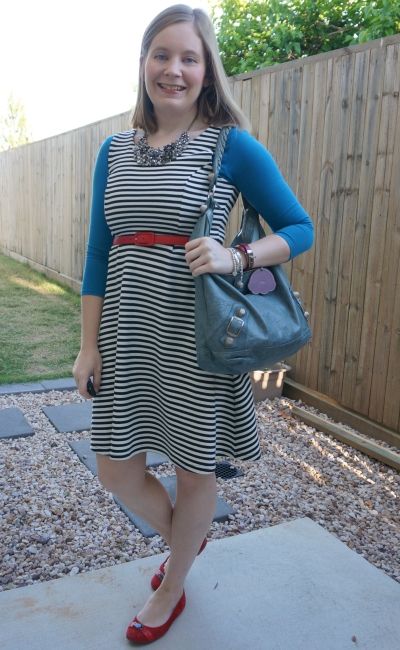 teal tee under striped fit and flare sleeveless dress with red accessories and balenciaga day bag | away from blue