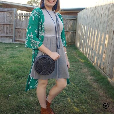 awayfromtheblue Instagram | green floral duster with a skater dress and ankle boots straw circle crossbody bag