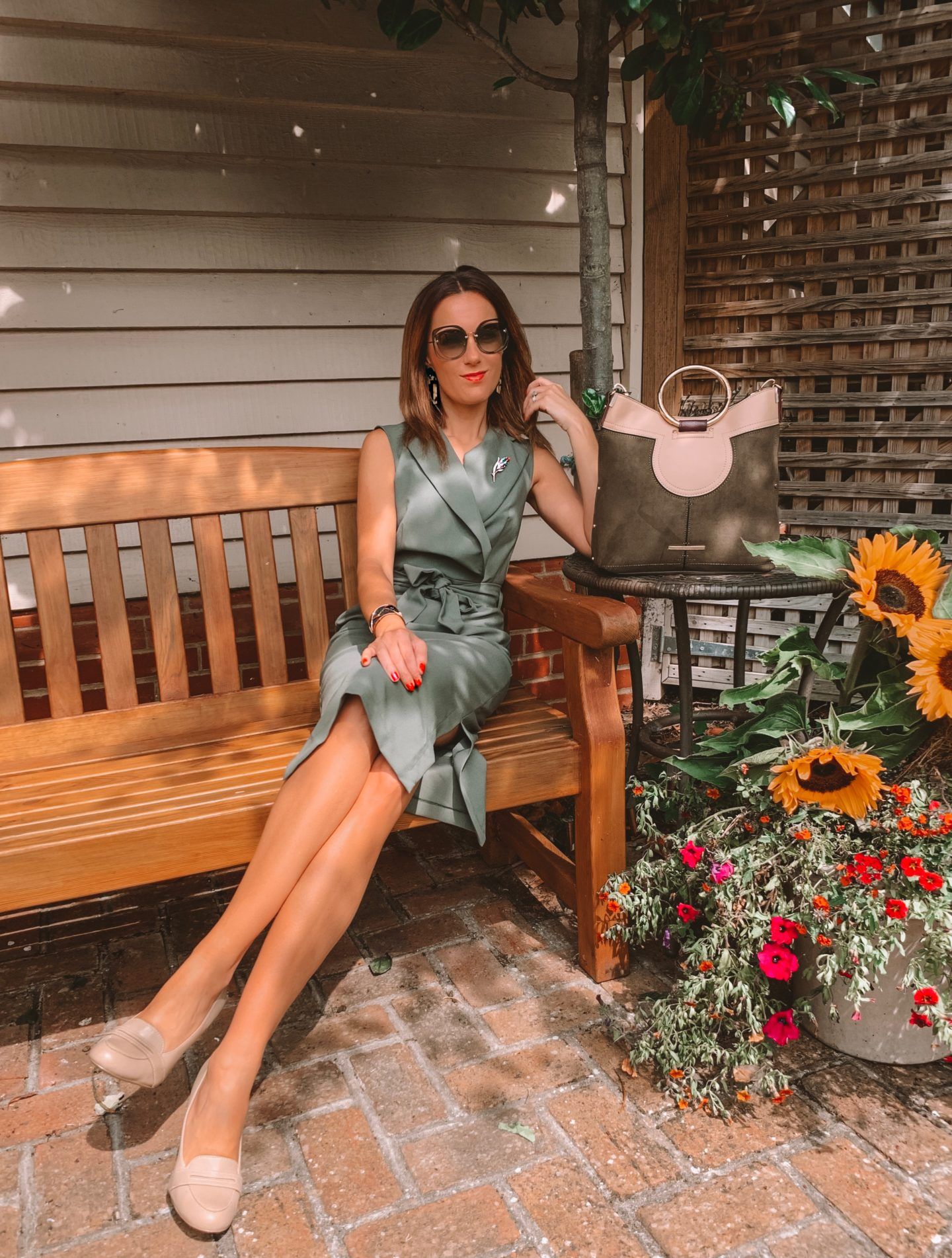 Closet London Khaki Collared Midi Pencil Dress | Elegant Duchess Boutique brooch | Miu Miu sunglasses | River Island Bag