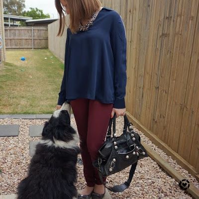 awayfromtheblue Instagram | burgundy skinny pants with Target navy collared blouse with balenciaga part time bag