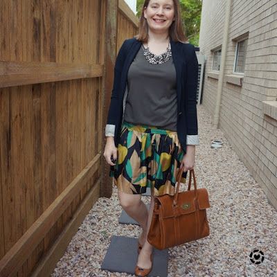 awayfromblue Instagram | olive tee statement necklace jersey blazer silk skirt in office with mulberry bayswater tote